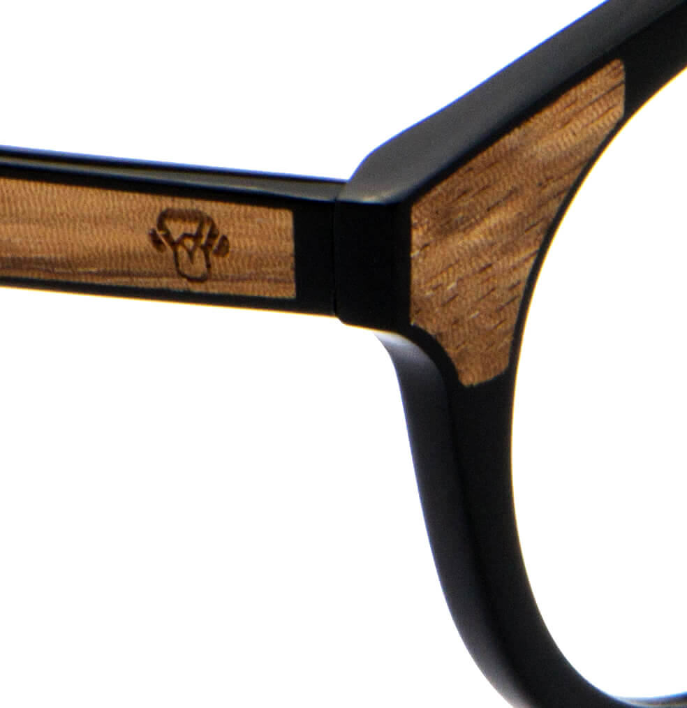 marcos ópticos armazones sustentables redondos de acetato con madera natural chiloe 0084 negro mayorista de optica regalos corporativos ecologicos hombre de cara ovalada detalle#color_negro