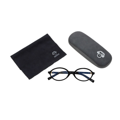 Blueberry Black vista desde arriba de lentes de lectura ovalados para mujer tipo miu miu con filtro de luz azul para las pantallas con estuche rigido tipo almeja y paño de limpieza