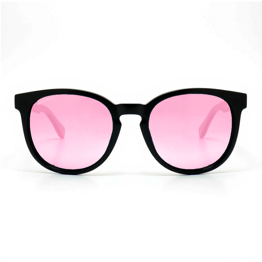 anteojos redondos de plástico reciclado y varillas de madera natural sustentable con lentes de color rosado polarizadas y forma redonda.  #color_rosado
