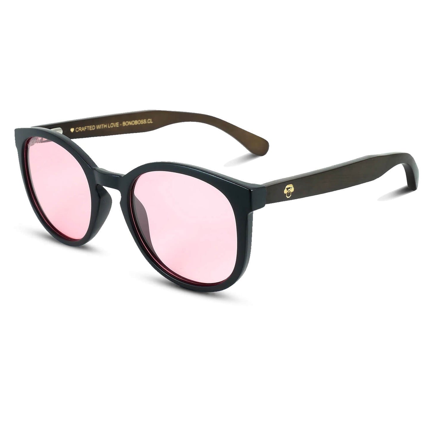 anteojos redondos de plástico reciclado y varillas de madera natural sustentable con lentes de color rosado polarizadas y forma redonda.   #color_rosado