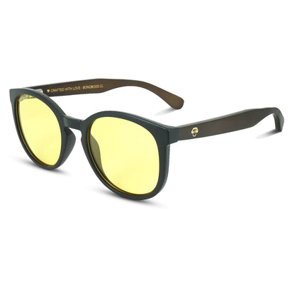 anteojos redondos de plástico reciclado y varillas de madera natural sustentable con lentes de color amarillo polarizadas y forma redonda. #color_amarillo