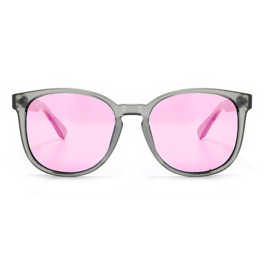 anteojos redondos de plástico reciclado y varillas de madera natural sustentable con lentes de color rosado. Polarizadas y forma redonda. La gafa es color transparente #color_rosado