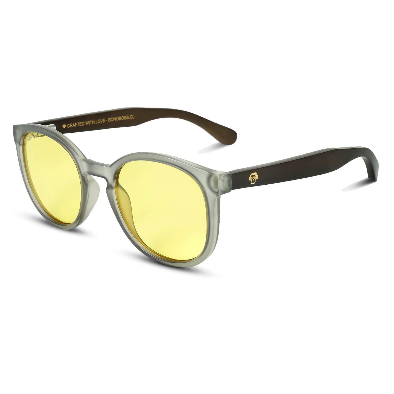 anteojos redondos de plástico reciclado y varillas de madera natural sustentable con lentes de color amarillo. Polarizadas y forma redonda. La gafa es color transparente  #color_amarillo