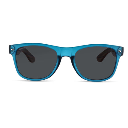 Acacia lentes polarizados azul ocean visto de frente hombre y mujer #color_ocean