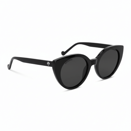 vista lateral de unos anteojos de sol gafa polarizada de forma agatada retro para hombre y mujer de cara redonda grande #color_negro