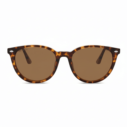 la vista frontal de unas gafas anteojos de sol polarizados de color carey con lentes de color cafe . Estos lentes quedan bien en mujeres y hombres de cara redonda #color_carey