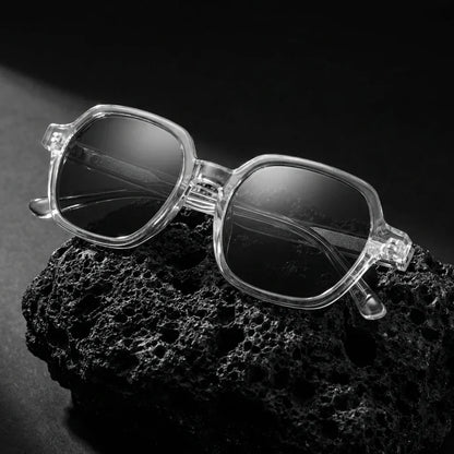 Lentes sol Canarias polarizados UV400 sobre roca volcanica textura natural Bonoboss #color_transparente