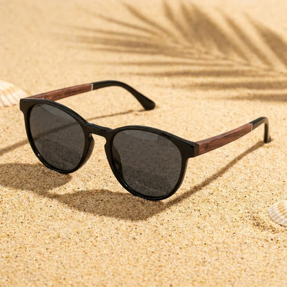 Lentes sol Chiloé 220 polarizados UV400 sobre arena dorada costa textura natural Bonoboss #color_negro
