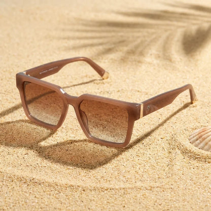 Lentes sol Montenegro polarizados UV400 sobre arena dorada costa textura natural Bonoboss #color_brown