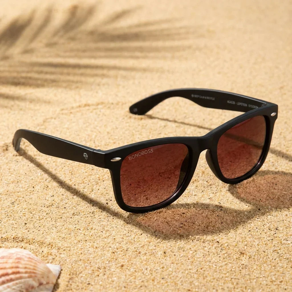 Lentes sol Acacio RPET polarizados UV400 sobre arena dorada costa textura natural Bonoboss #color_rojo
