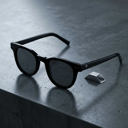 Lentes sol Meli polarizados UV400 sobre concreto urbano textura industrial Bonoboss #color_negro
