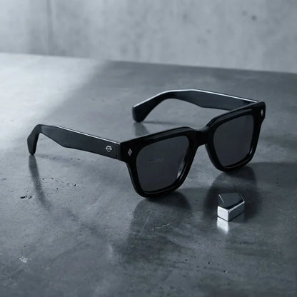 Lentes sol Bruno polarizados UV400 sobre concreto urbano textura industrial Bonoboss #color_negro