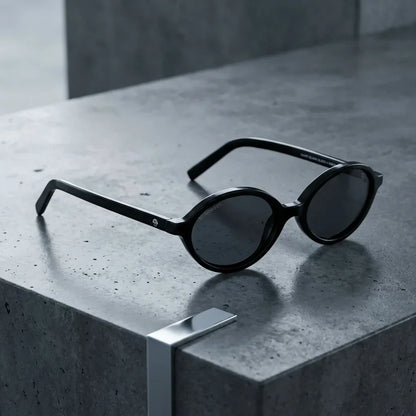 Lentes sol Guapi Island polarizados UV400 sobre concreto urbano textura industrial Bonoboss #color_negro