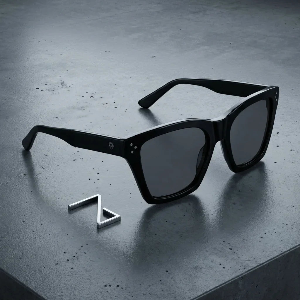 Lentes sol Bruna polarizados UV400 sobre concreto urbano textura industrial Bonoboss #color_negro