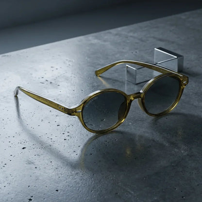 Lentes sol Capri polarizados UV400 sobre concreto urbano textura industrial Bonoboss #color_olive-light