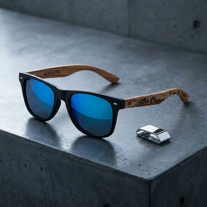 Lentes sol Acacia Designer's polarizados UV400 sobre concreto urbano textura industrial Bonoboss #color_surf-sky