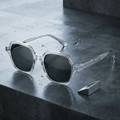 Lentes sol Canarias polarizados UV400 sobre concreto urbano textura industrial Bonoboss #color_transparente