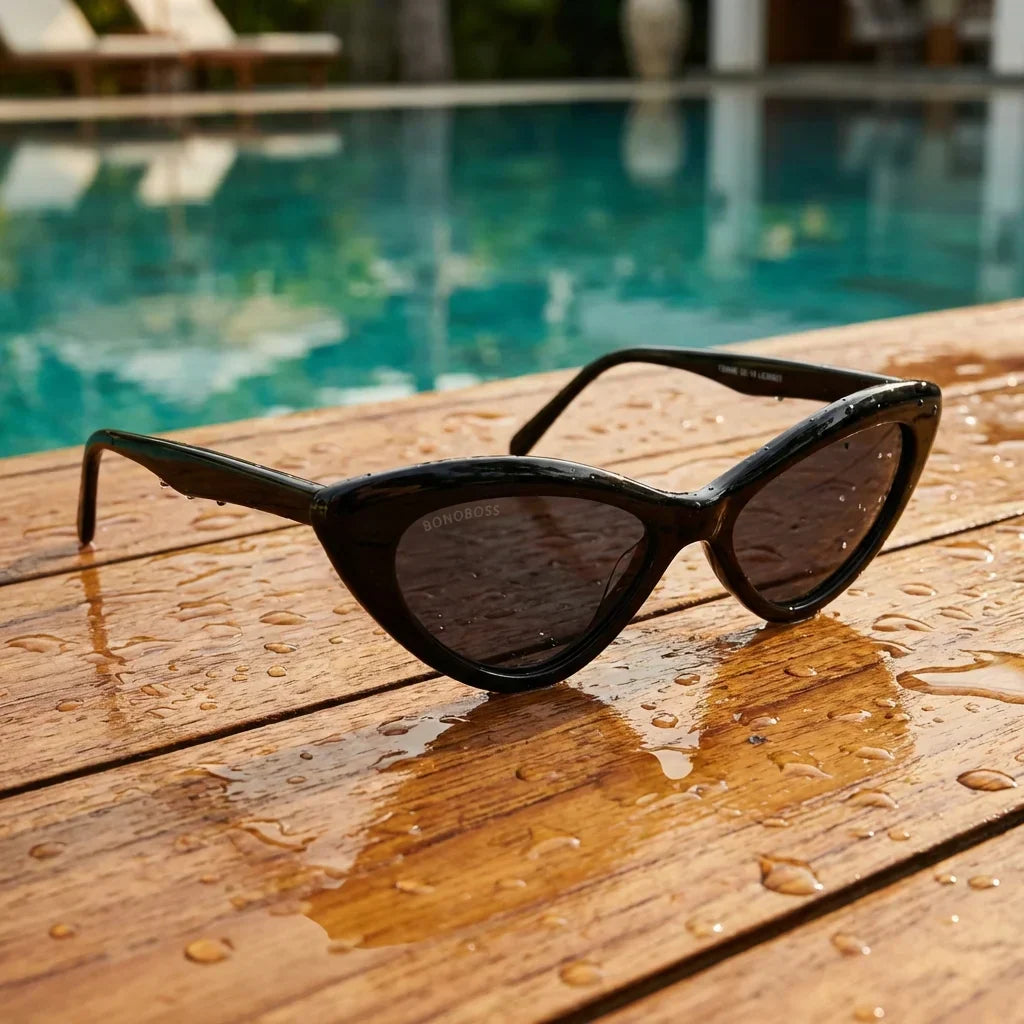 Lentes sol Femme Black polarizados UV400 sobre madera teca con agua fresca Bonoboss #color_negro