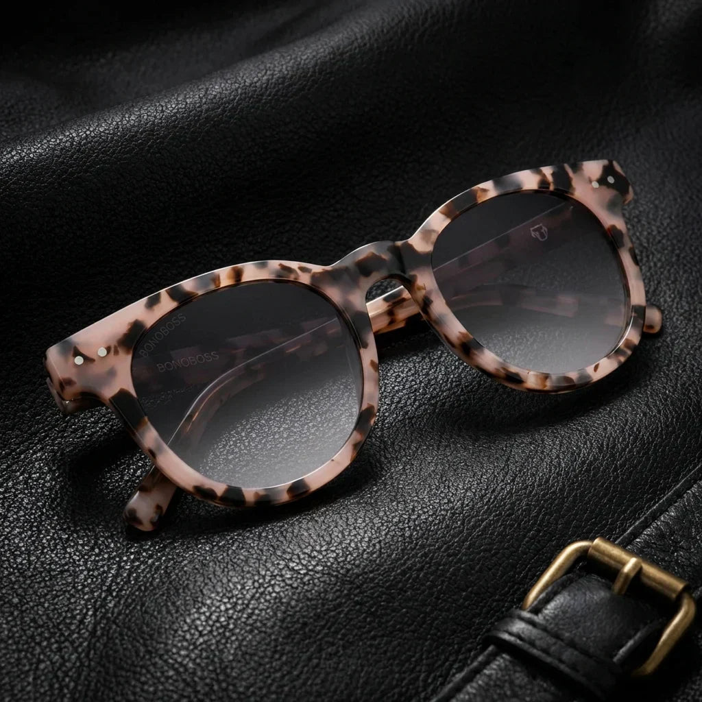 Lentes sol Meli polarizados UV400 bio-acetato marble sobre cuero negro brass detalle premium contraste Bonoboss #editorial_grid1 #color_marble