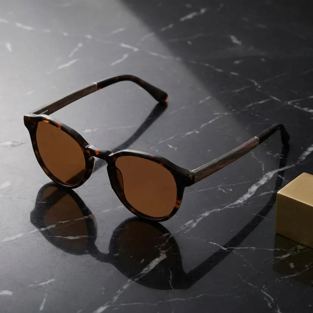 Lentes sol Galápagos polarizados UV400 sobre marmol negro superficie elegante Bonoboss #color_carey