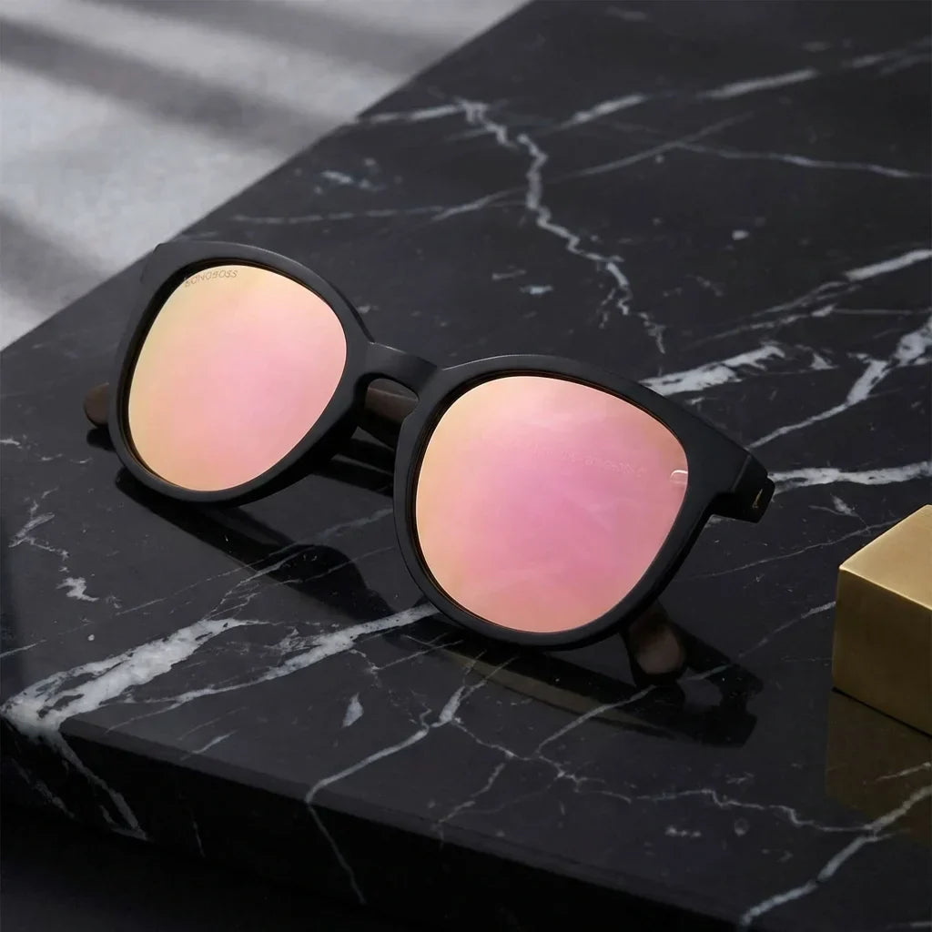 Lentes sol Meli Dark polarizados UV400 bio-acetato Espejado Rosado sobre marmol negro Bonoboss #editorial_grid1 #color_espejado-rosado