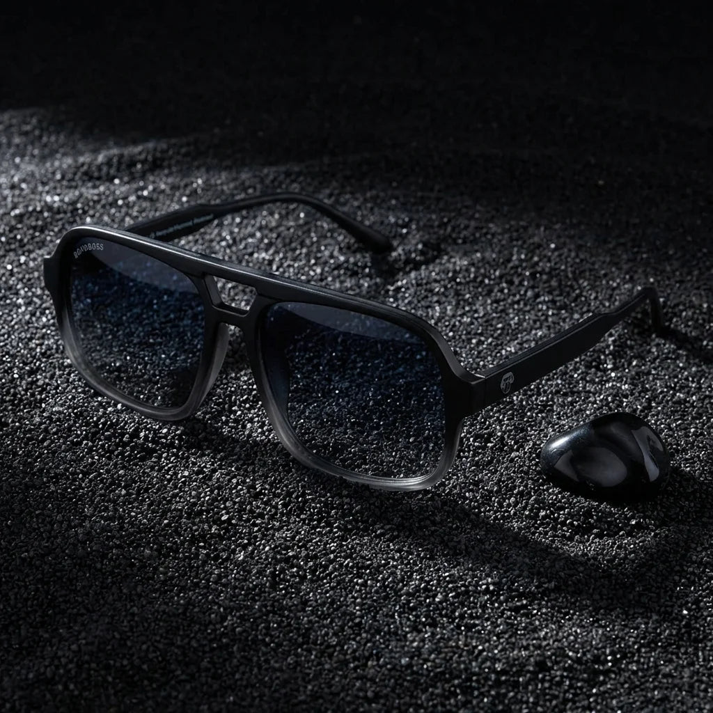 Lentes sol Orson RPET polarizados UV400 sobre arena negra volcanica Bonoboss #color_negro