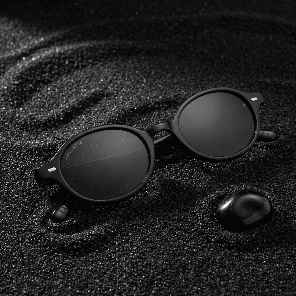 Lentes sol Capri polarizados UV400 sobre arena negra volcanica Bonoboss #color_negro