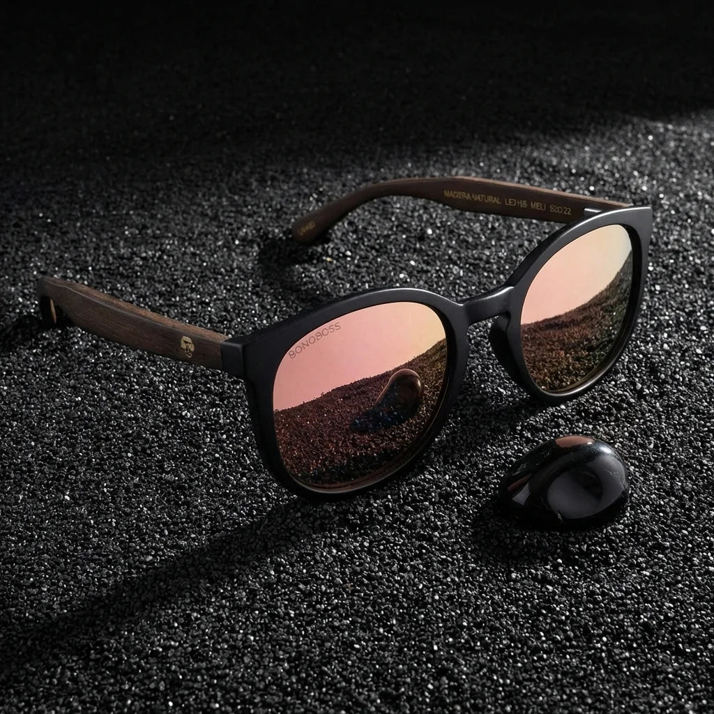 Lentes sol Meli Dark polarizados UV400 sobre arena negra volcanica Bonoboss #color_espejado-rosado