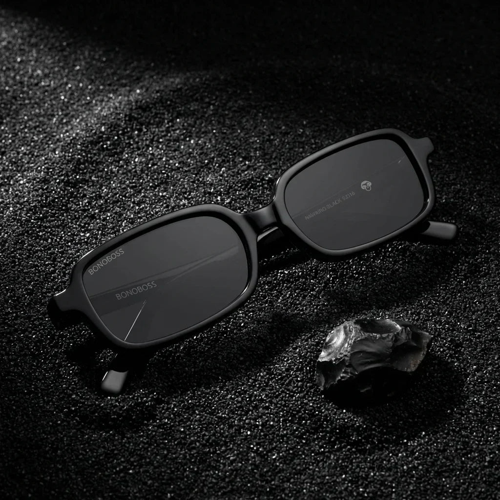 Lentes sol Navarino polarizados UV400 sobre arena negra volcanica Bonoboss #color_negro