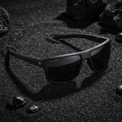 Lentes sol Ollie polarizados UV400 sobre arena negra volcanica Bonoboss #color_negro