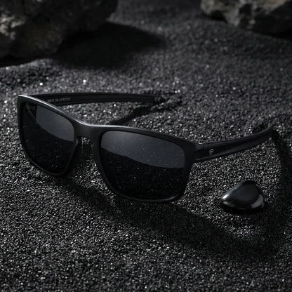 Lentes sol Lautaro RPET polarizados UV400 sobre arena negra volcanica Bonoboss #color_negro