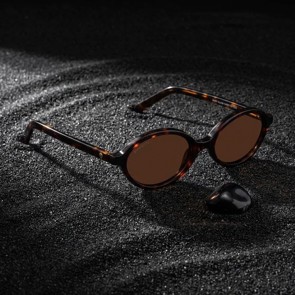 Lentes sol Guapi Island polarizados UV400 sobre arena negra volcanica Bonoboss #color_carey