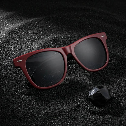 Lentes sol Valencia polarizados UV400 sobre arena negra volcanica Bonoboss #color_rojo