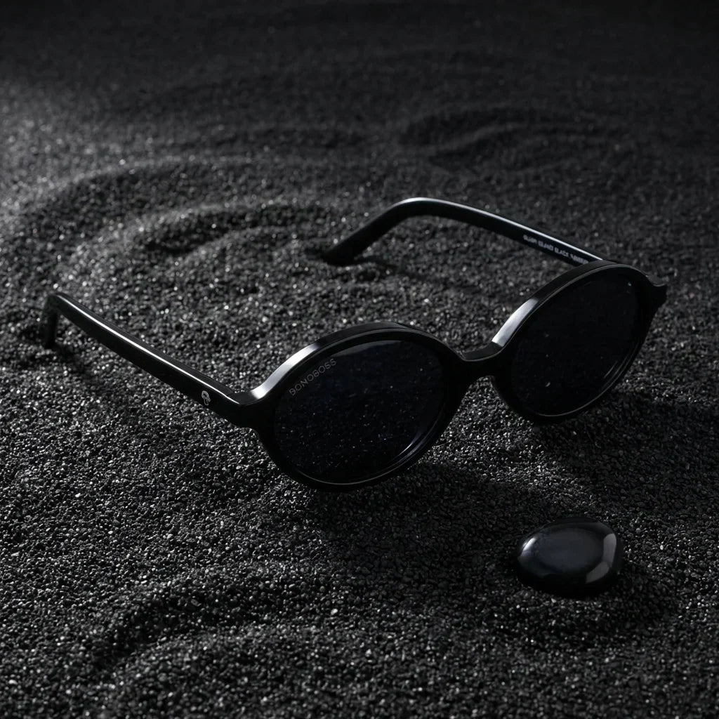 Lentes sol Guapi Island polarizados UV400 sobre arena negra volcanica Bonoboss #color_negro