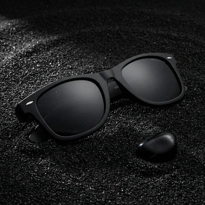 Lentes sol Acacio RPET polarizados UV400 sobre arena negra volcanica Bonoboss #color_negro