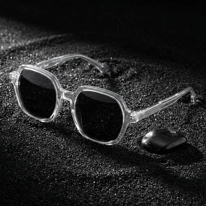 Lentes sol Canarias polarizados UV400 sobre arena negra volcanica Bonoboss #color_transparente