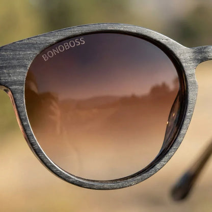 Lentes sol Chiloé 110 Wood polarizados UV400 detalle lente coating espejado precision optica Bonoboss #color_brown
