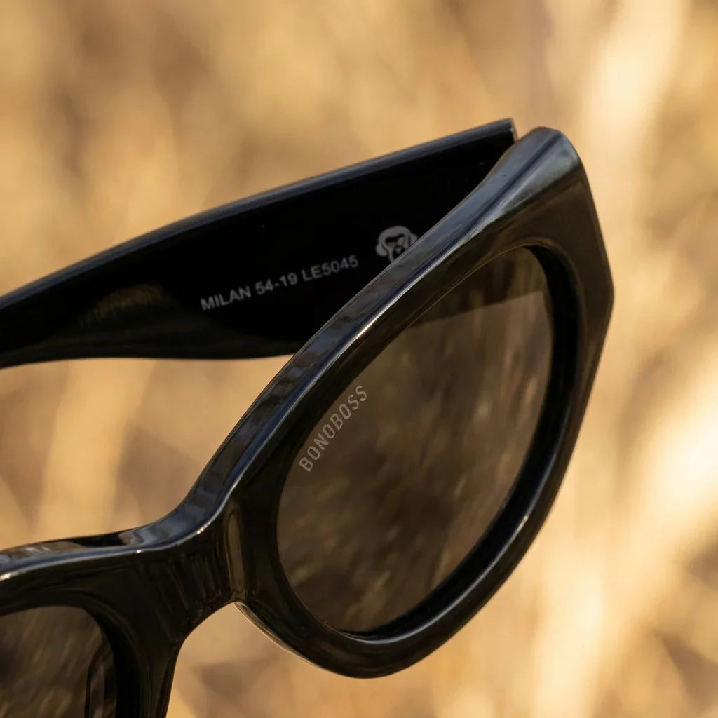 Lentes sol Milan polarizados UV400 bio-acetato negro close-up acetato textura vetas detalle material premium Bonoboss #editorial_grid1 #color_negro