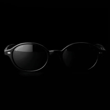 Lentes sol Capri polarizados UV400 frontal dramatico luz editorial Bonoboss #color_negro