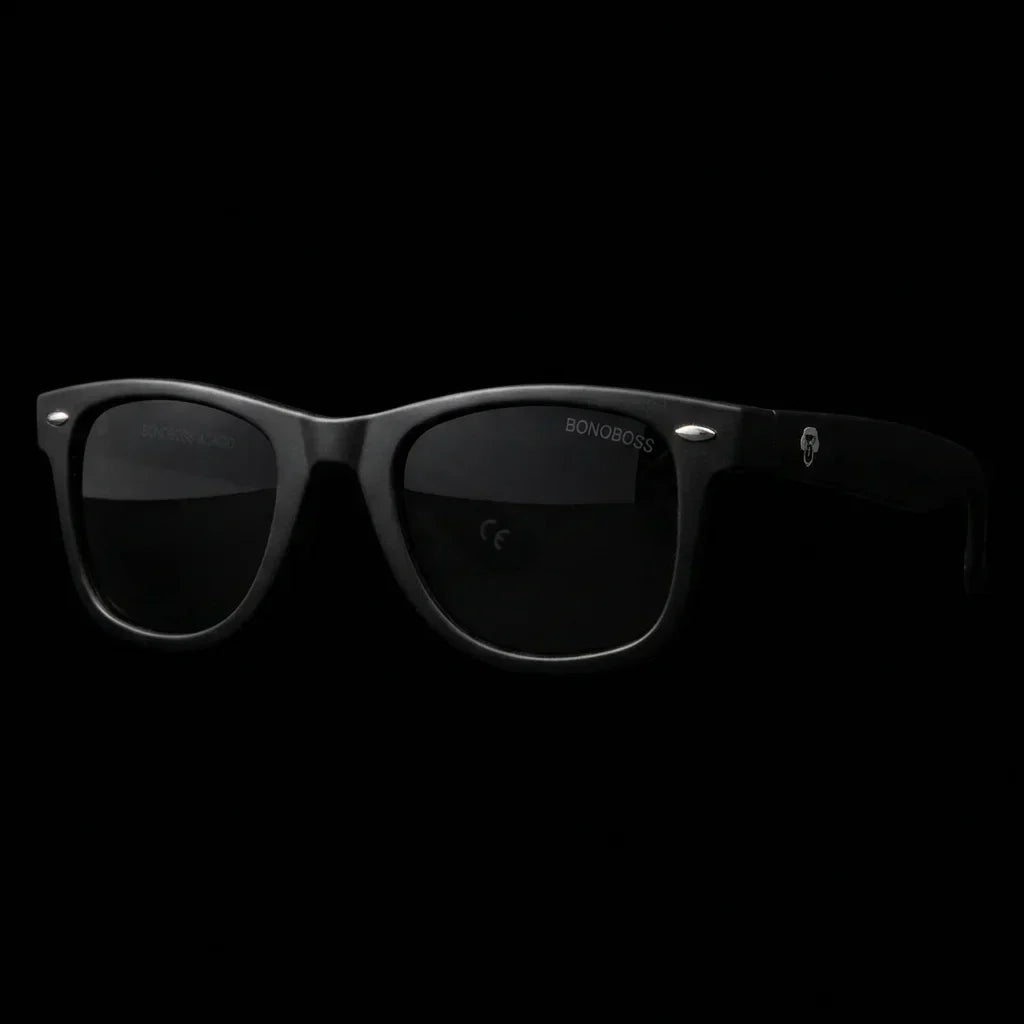 Lentes sol Acacio RPET polarizados UV400 frontal dramatico luz editorial Bonoboss #color_negro