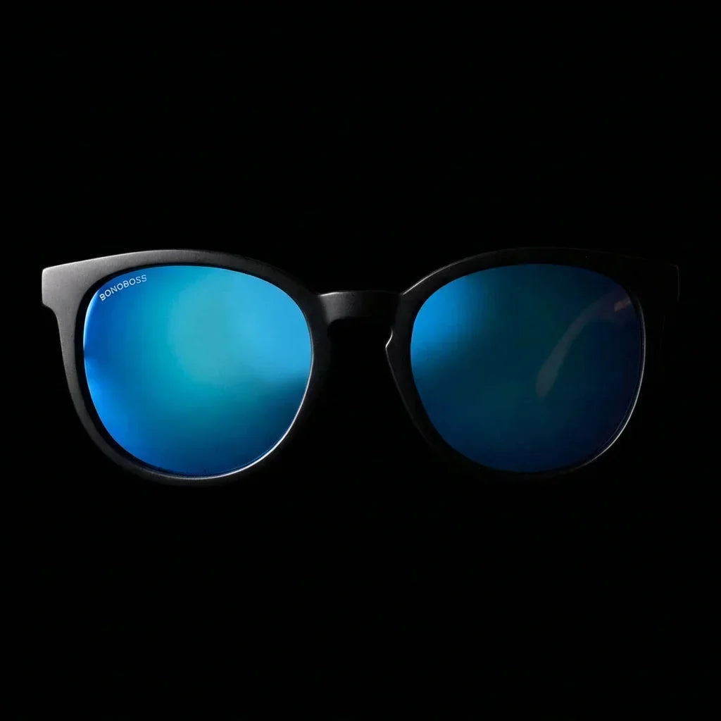 Lentes sol Meli Dark polarizados UV400 frontal dramatico luz editorial Bonoboss #color_espejado-azul