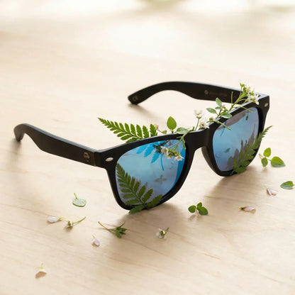 Vista frontal del modelo Acacia Dark lentes con receta sky acabado clásico #color_sky