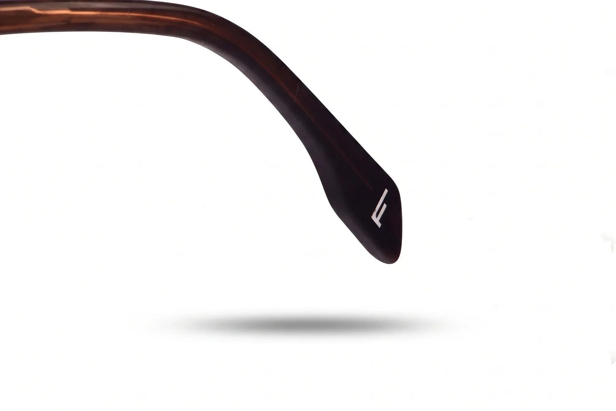 Anteojos de sol Fiore 10177 Carey con cristal espejado rosado: detalle del logo grabado en la patilla #color_espejado-rosado