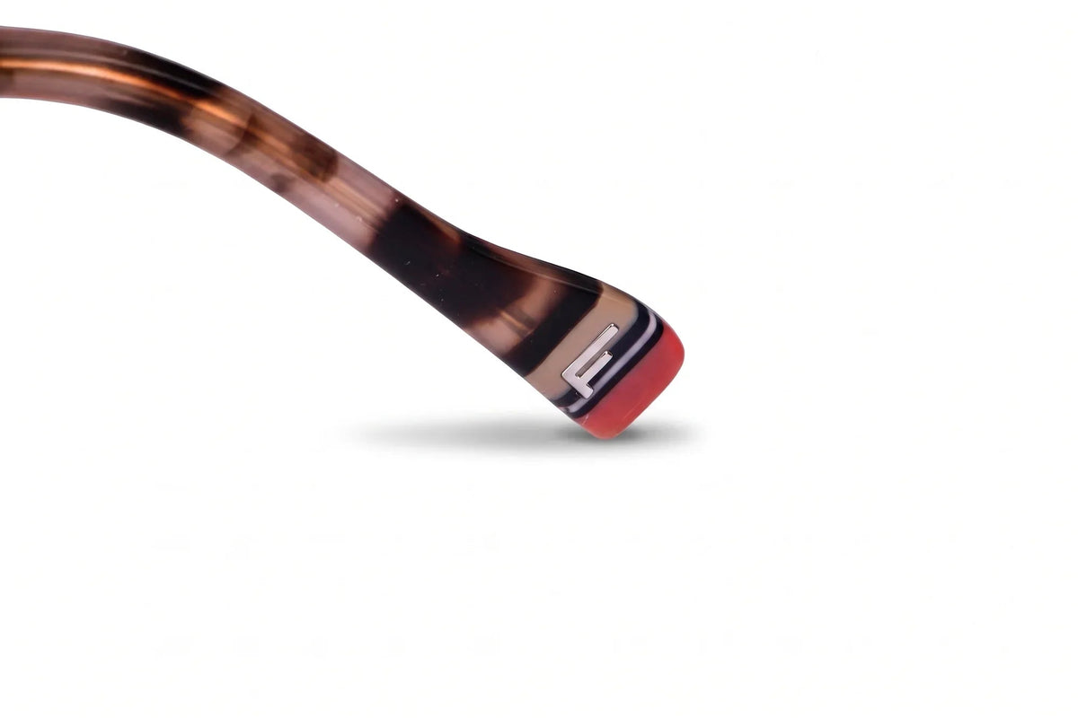 Anteojos de sol Fiore 3983 Rosado con cristal café: detalle del logo grabado en la patilla #color_cafe