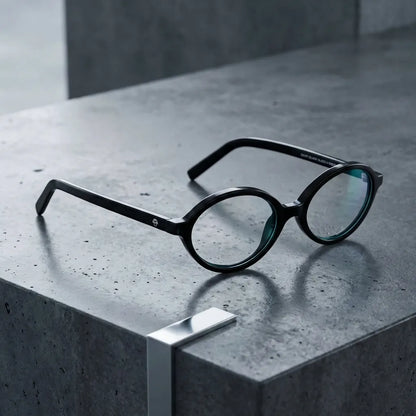 Lentes opticos Guapi Island Negro sobre concreto urbano minimalista antirreflex receta optica bio-acetato Bonoboss #editorial_concreto-urbano #color_negro