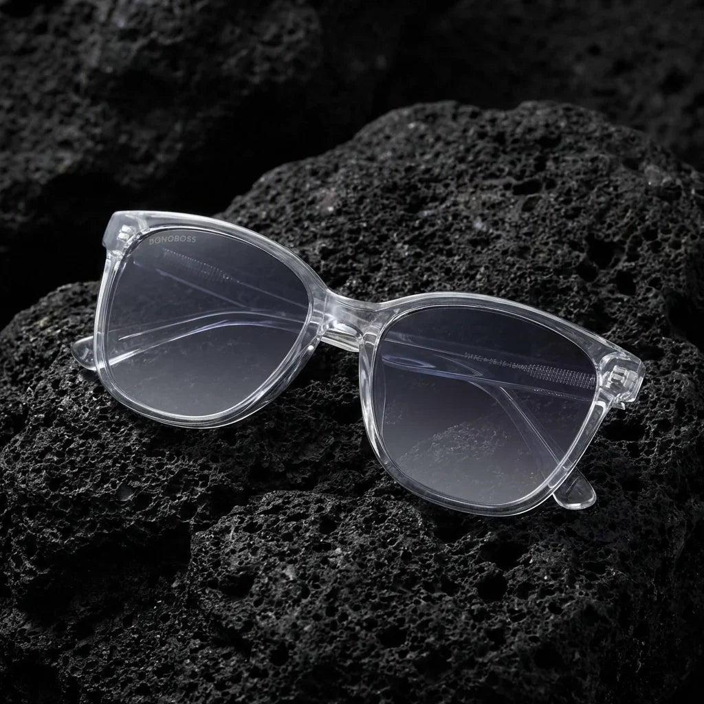 Lentes sol Tiare polarizados UV400 bio-acetato cat eye transparente sobre roca volcanica contraste cristalino Bonoboss #editorial_polarizado #color_transparente