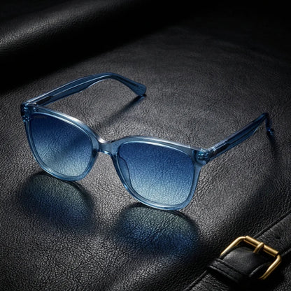 Lentes sol Tiare polarizados UV400 bio-acetato cat eye azul sobre cuero negro detalle brass premium Bonoboss #editorial_grid1 #color_azul