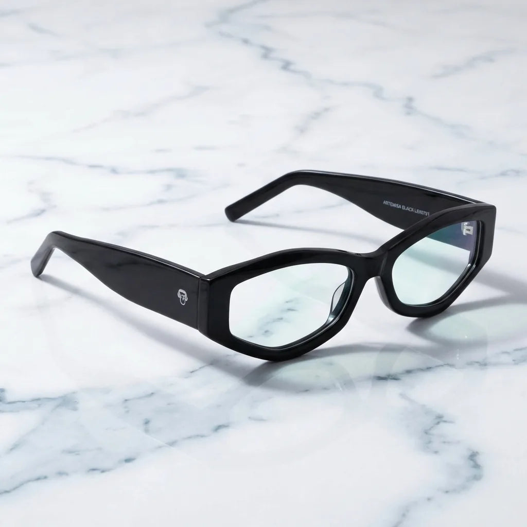 Lentes ópticos Artemisa Negro sobre mármol blanco elegante armazón premium Bonoboss #editorial_armazon #color_negro