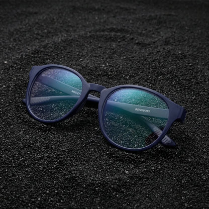 Lentes ópticos Ashley Azul sobre arena volcánica texturizada diseño sustentable Bonoboss #editorial_sustentabilidad #color_azul