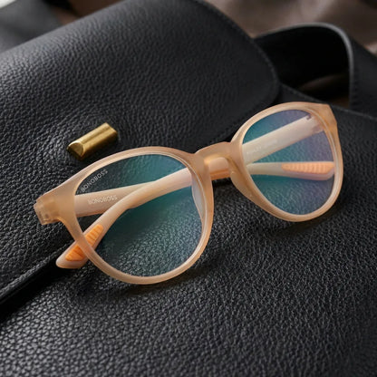 Ashley lentes pregraduados champagne visto de frente hombre y mujer #color_champagne